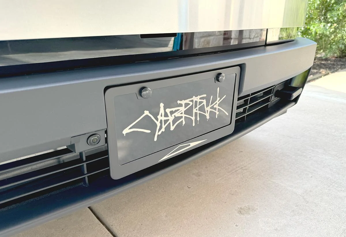 2027 Ram Dakota Pickup ? License Plate Accessories Discount Code for July 4th weekend club-vanity-cybertruck-graffiti-frame-left